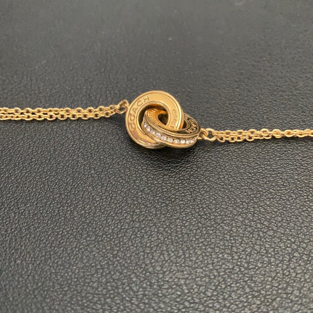 Gold Plated Coach Interlock Rhinestone Bracelet